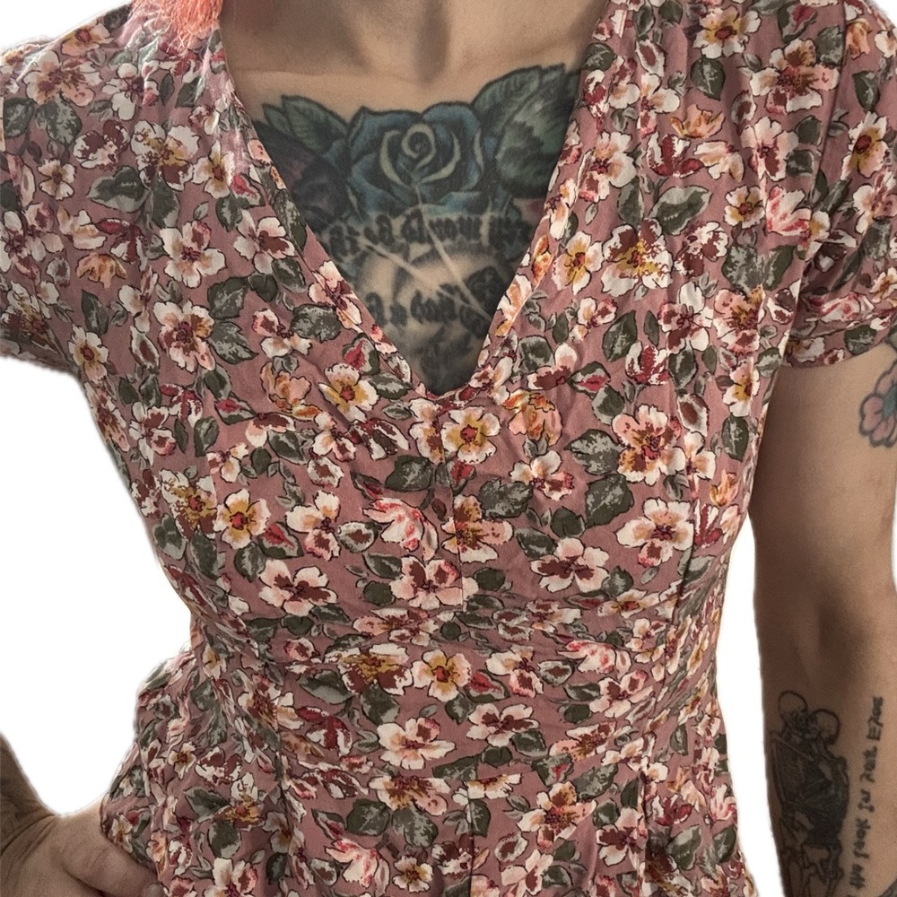 Adorable floral romper with peekaboo back